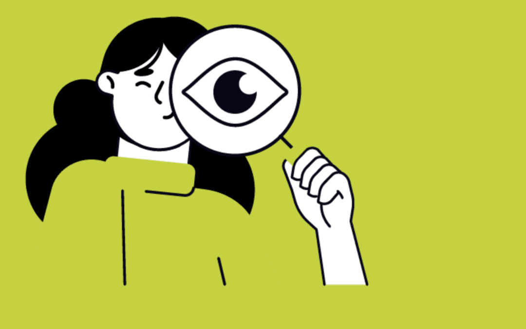 Person holding magnifying glass eye